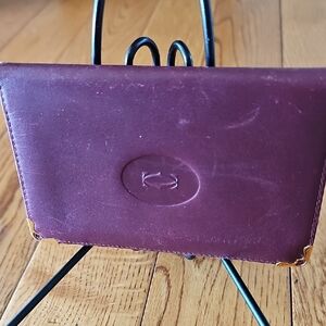 Cartier Burgundy Leather Wallet with Gold Accents